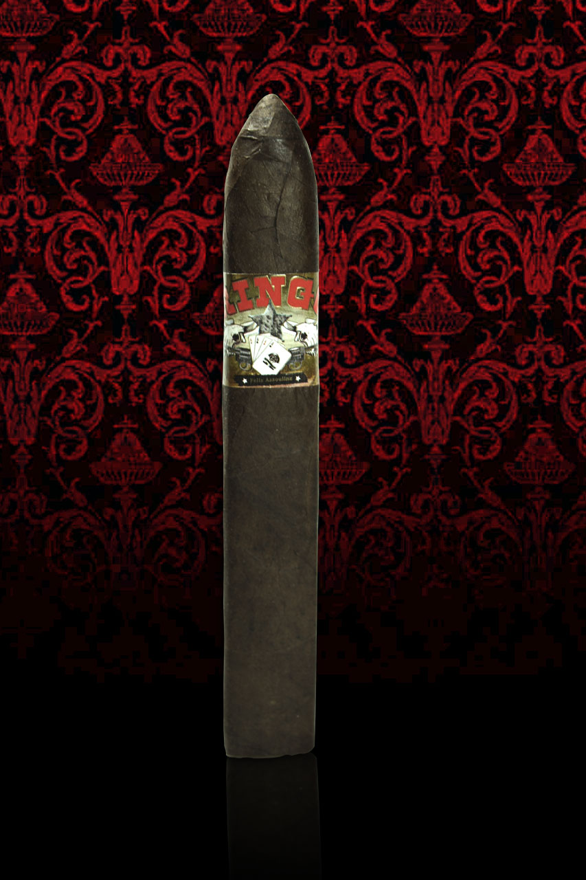 A single Ringo Colt lancero against red damask