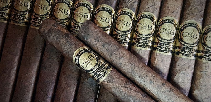 CSB Fuerte cigars side by side under black-and-gold bands