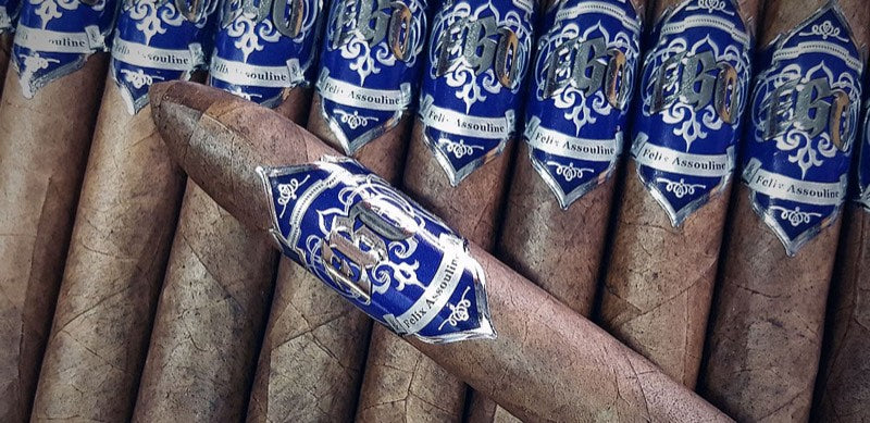 EGO Ocean Blue cigars side by side, each wearing a deep blue band