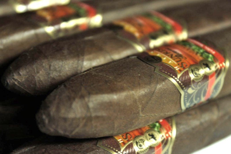 Havana Sunrise Reserve cigars with red, green and gold bands