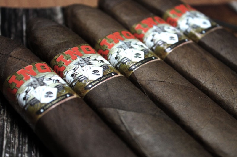 Ringo cigars in a row, their bands showing a Western emblem