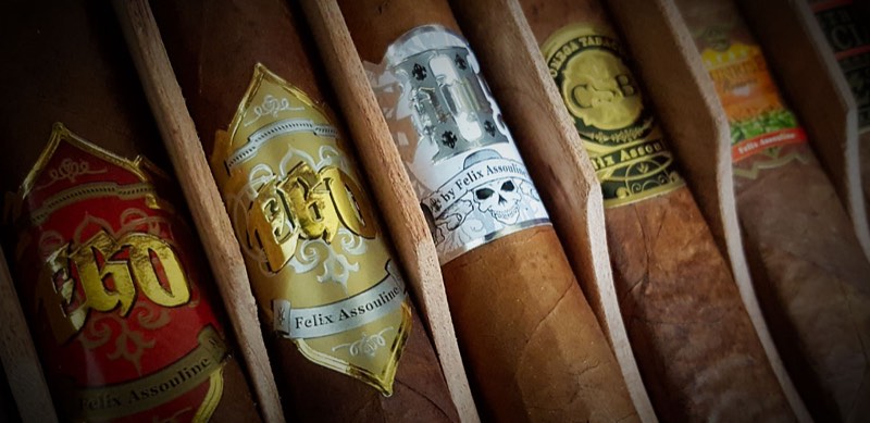 EGO cigars of several blends lying banded side by side in the box