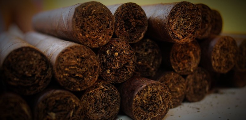 Finished cigars stacked feet forward